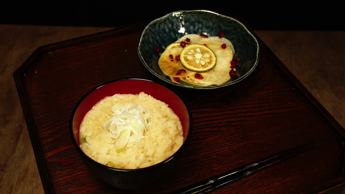 七日目の膳。ねぎ雑炊と大根三ツ輪漬が並んでいる